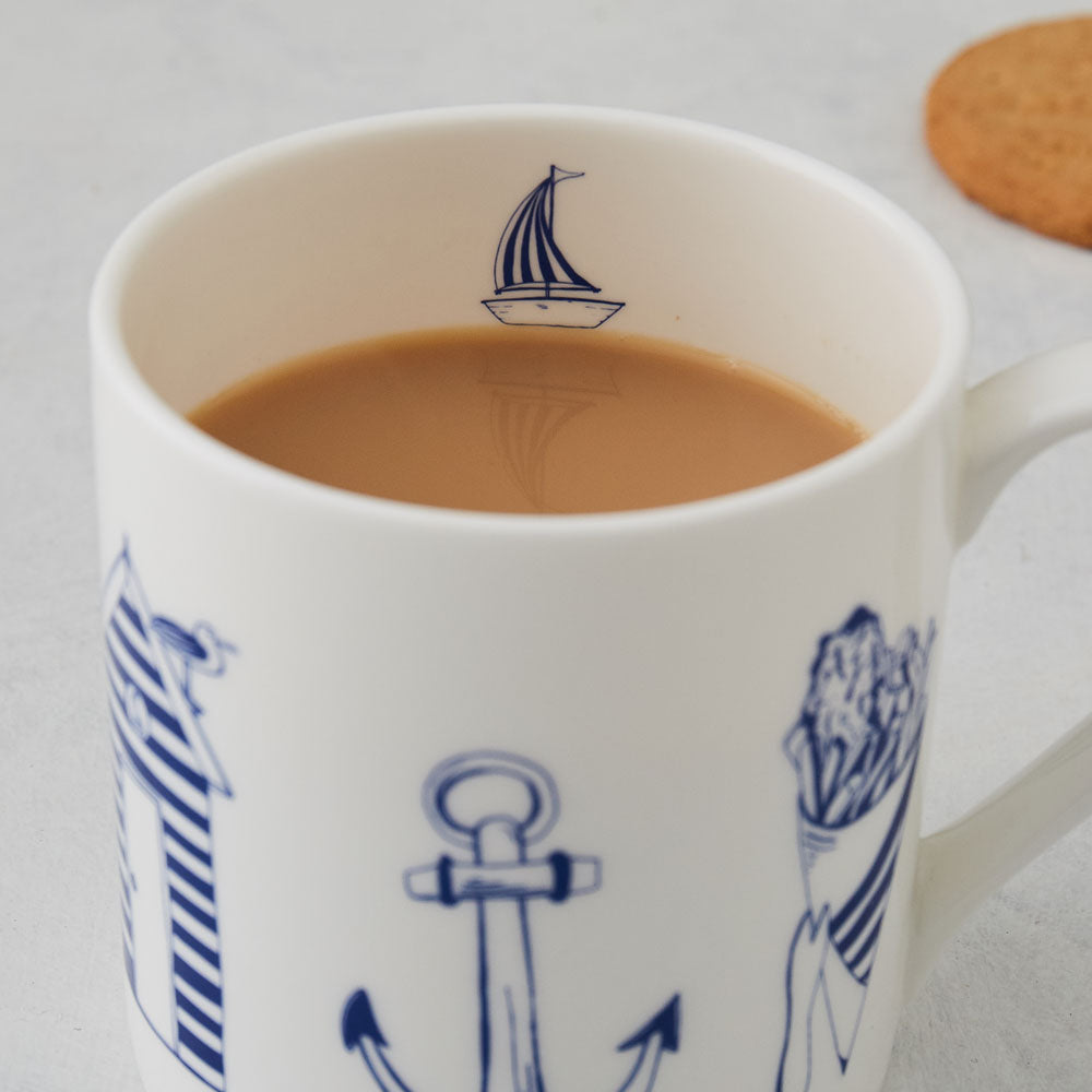 Fine bone china mug featuring nautical design in navy and white, Nautical mug featuring large nautical icons in navy and white, Fine china mug featuring nautical design in navy