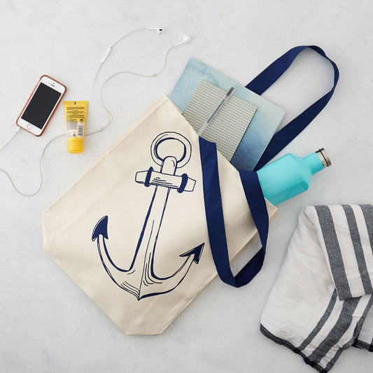 Double sided canvas bag featuring nautical design of an anchor and sailboat, Nautical canvas bag featuring both an anchor and sailboat design in navy, Reusable nautical bag featuring large anchor and sailboat design in navy