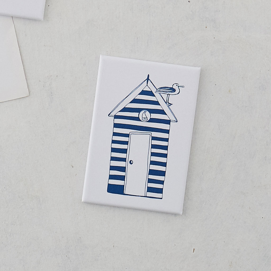 Rectangular magnet featuring beach hut and seagull design in navy and white, Navy and white striped beach hut magnet, Nautical magnet featuring navy and white beach hut and seagull design