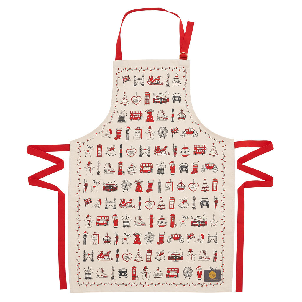Adult's Christmas apron featuring various London Christmas icons, Red strapped London icons Christmas apron, Hand illustrated Christmas apron, Cotton Christmas apron featuring iconic London Christmas favorites, Christmas apron with repeating London Christ