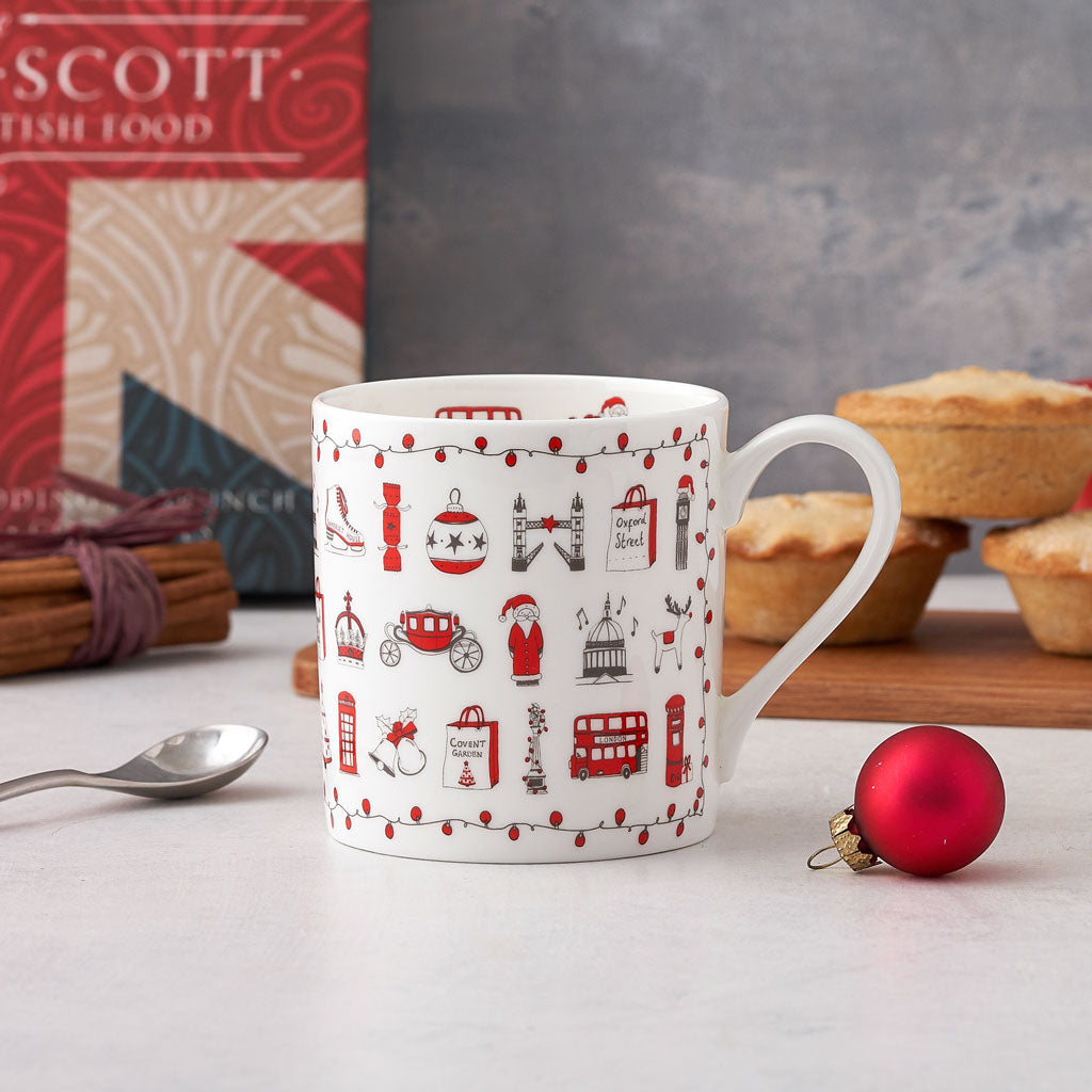 Fine bone china Christmas mug from London, Fine china mug featuring repeating Christmas icons from London, Hand illustrated Christmas mug with red and charcoal designs, Christmas mug from London with Santa's sleigh and ice skates, Christmas mug with vario