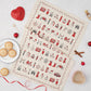 Christmas tea towel featuring repeating iconic landmarks in London, Christmas time in London tea towel, Christmas kitchen towel from London, Repeating charcoal and red Christmas icons from London tea towel, Christmas dish towel featuring London's iconic C