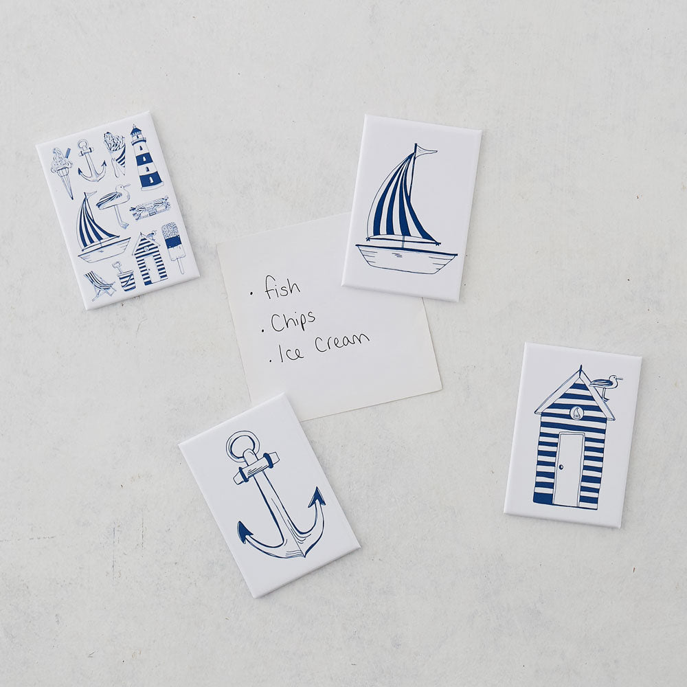 Set of four nautical magnets featuring large designs of nautical icons, Navy and white magnet set featuring nautical icons design, Set of four fridge magnet featuring nautical designs in navy and white
