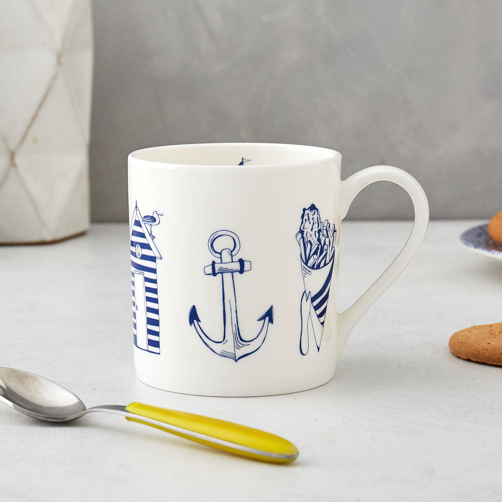 Fine bone china mug featuring nautical design in navy and white, Nautical mug featuring large nautical icons in navy and white, Fine china mug featuring nautical design in navy 