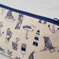 Cosmetic bag featuring repeating nautical design in navy, Pencil case featuring nautical design of repeating beachscape icons, Small nautical travel bag featuring repeating design of iconic nautical designs in navy