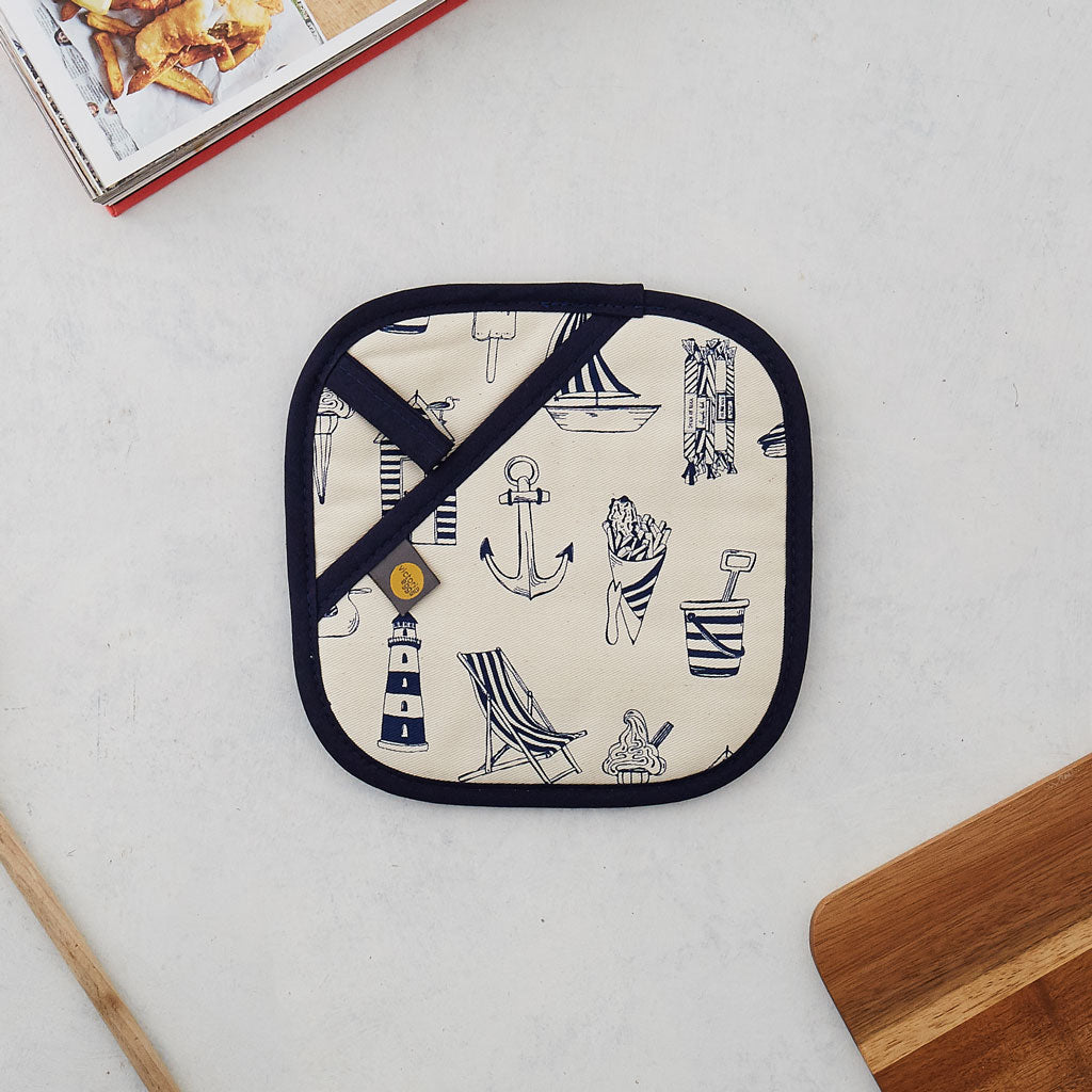 Nautical pot grab featuring repeating nautical icons design in navy, Double sided kitchen pot grab featuring large sailboat design and repeating nautical icons design in navy, Nautical navy pot grab featuring repeating pattern of nautical icons such as an
