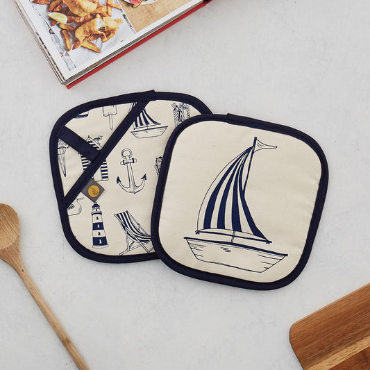 Nautical pot grab featuring repeating nautical icons design in navy, Double sided kitchen pot grab featuring large sailboat design and repeating nautical icons design in navy, Nautical navy pot grab featuring repeating pattern of nautical icons such as an