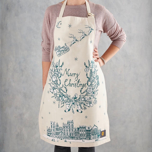 Santa and his reindeer flying over town Christmas apron, Santa delivering presents Christmas apron, Teal Christmas apron, Teal Christmas apron with Santa and his reindeer, Teal Merry Christmas apron