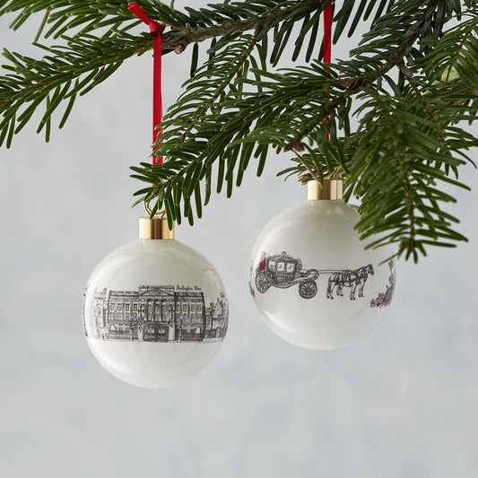 Glass bauble featuring Buckingham Palace and Windsor Castle, Glass Christmas ornament featuring iconic Royal icons, Christmas ornament with hand illustrated royal favorites, Charcoal detailed Christmas baubles with Buckingham palace