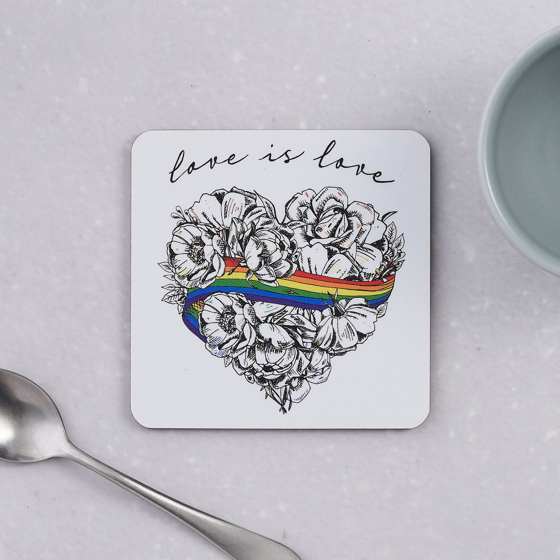 Love is Love, LGBTQ, Gay Pride, coaster, cork back, rainbow, heart, roses, hand decorated, handmade in Britain, Victoria Eggs. Rainbow, roses, heart shaped, illustration.